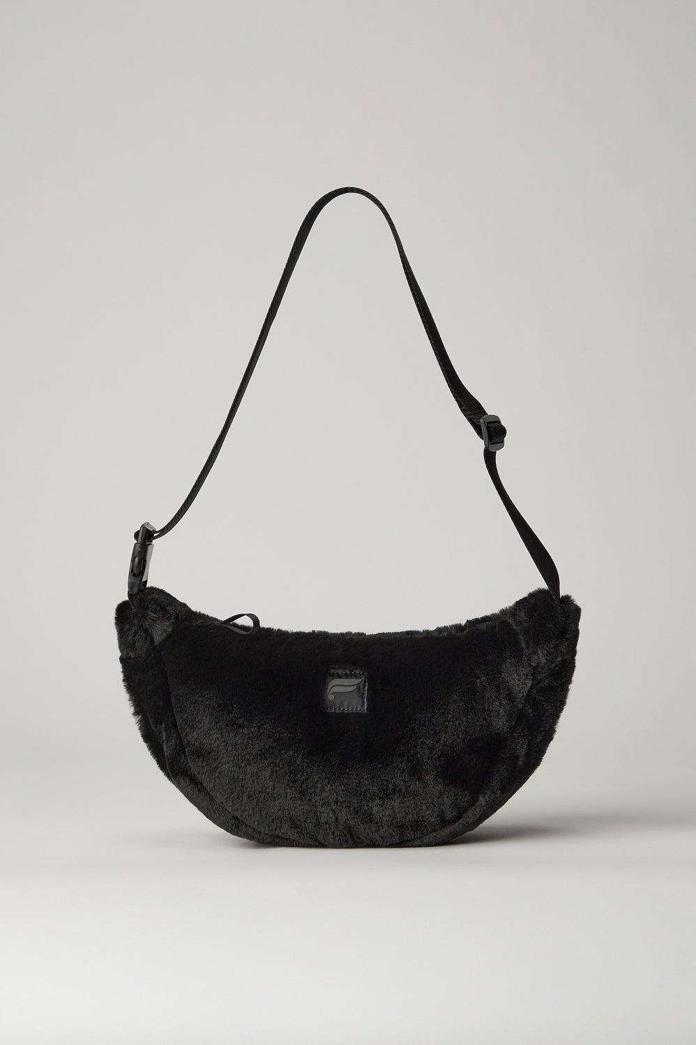 THE FAUX FUR SLING BAG