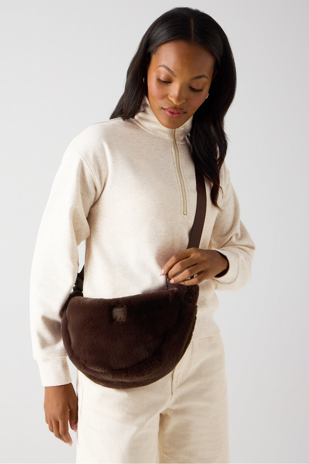 THE FAUX FUR SLING BAG
