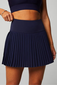 HOT SHOT PLEATED CLASSIC MINI SKIRT