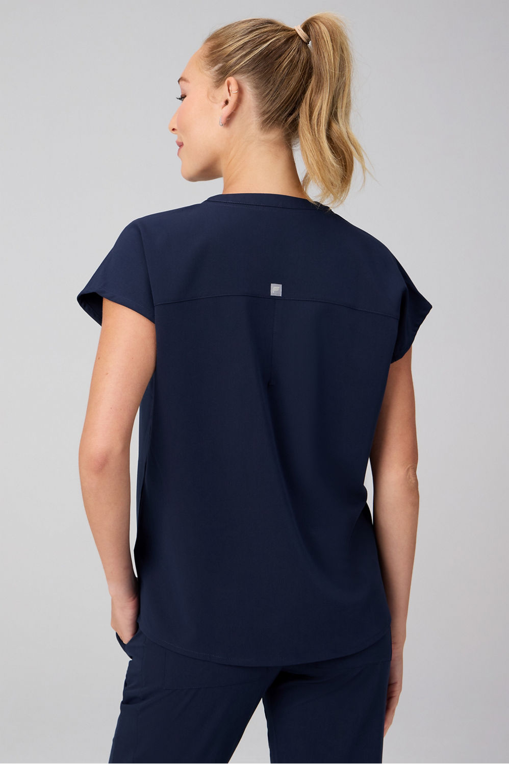 EVOLVE SCRUB TOP